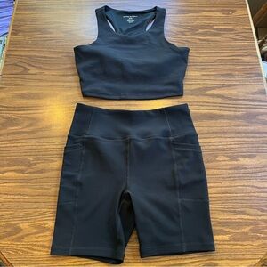 NWOT black ribbed biker shorts and bra top set
